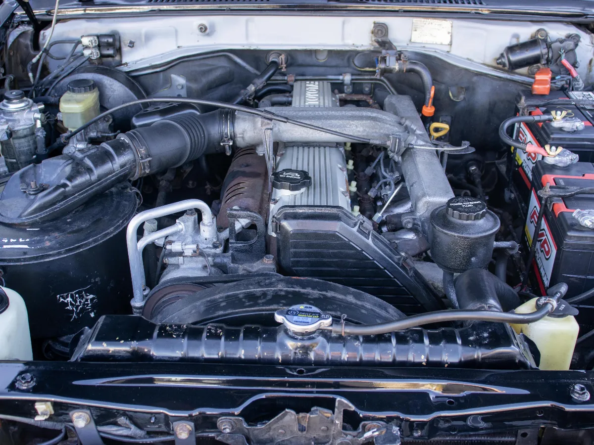 Under the hood of a 2001 Toyota Land Cruiser 70 at FLEX in Japan