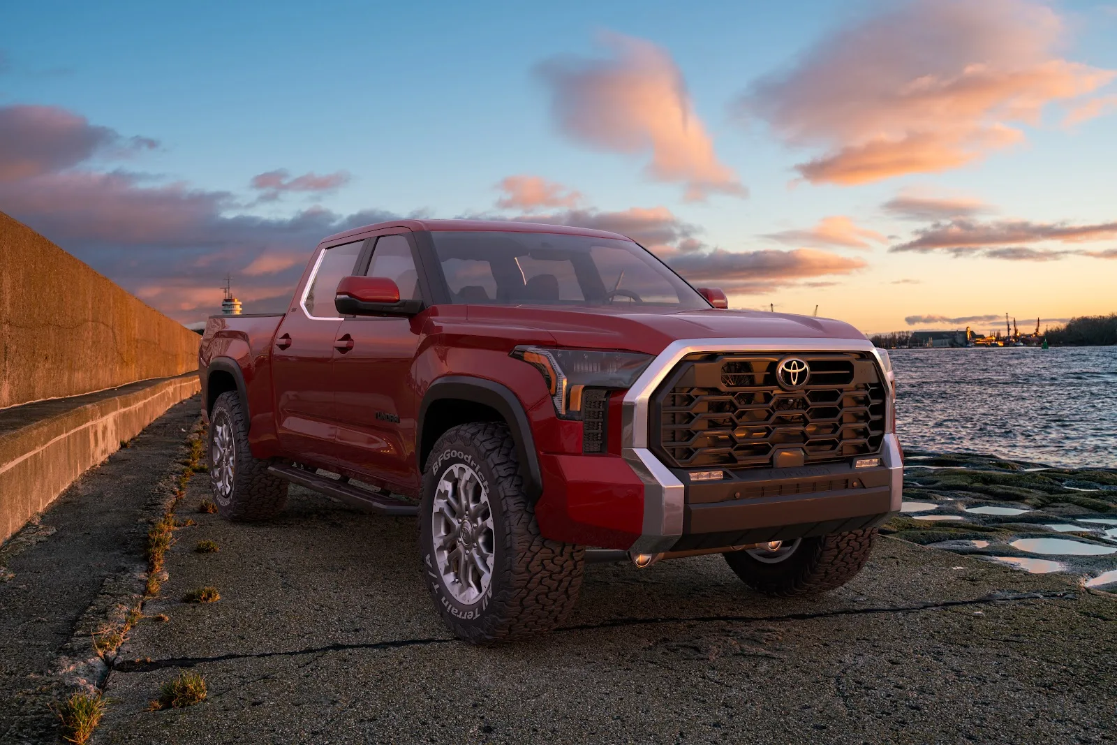 Red Toyota Tundra Parked alongside a beach