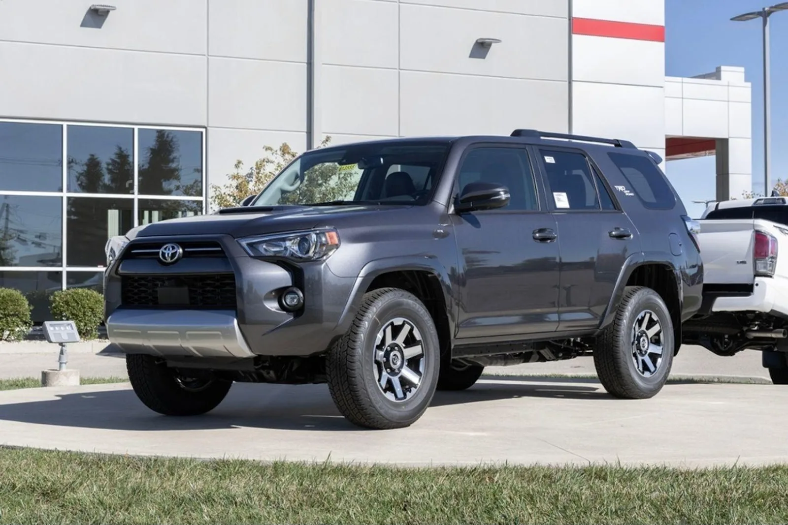 Dark Grey Toyota 4runner parked outside dealership