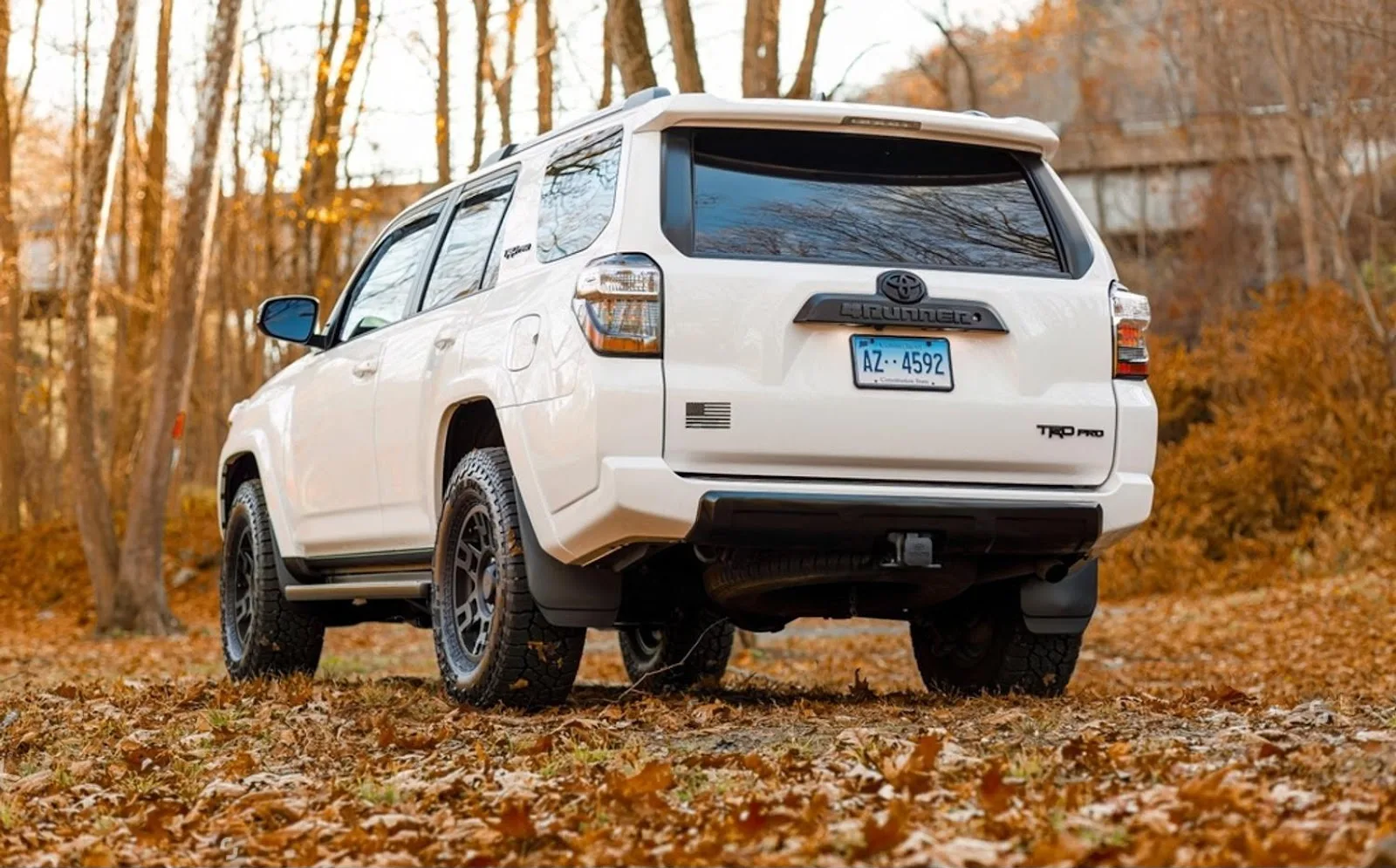 White Toyota 4runner on an Autumn evening