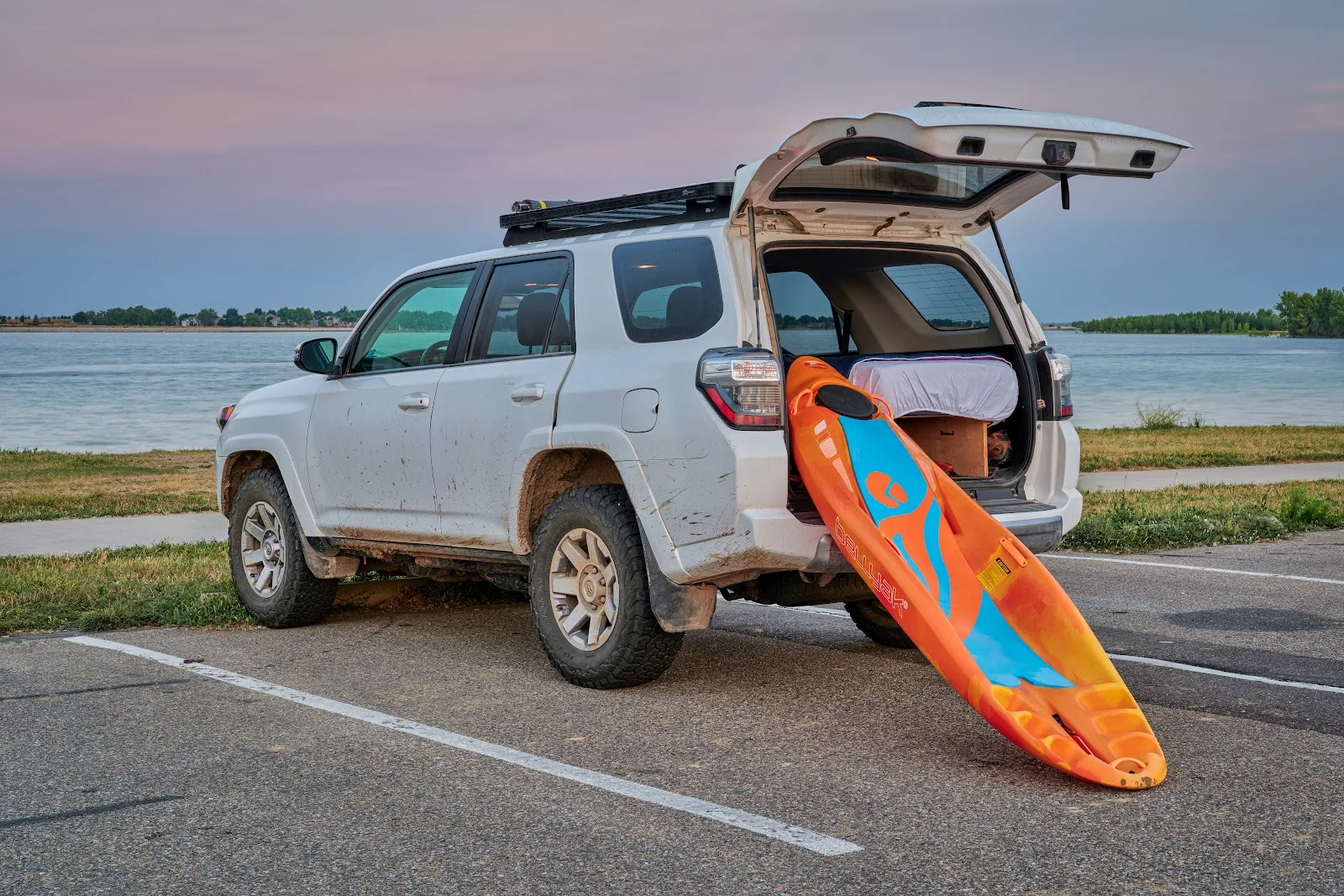 6th Gen 4Runner parked alongside a beach spot