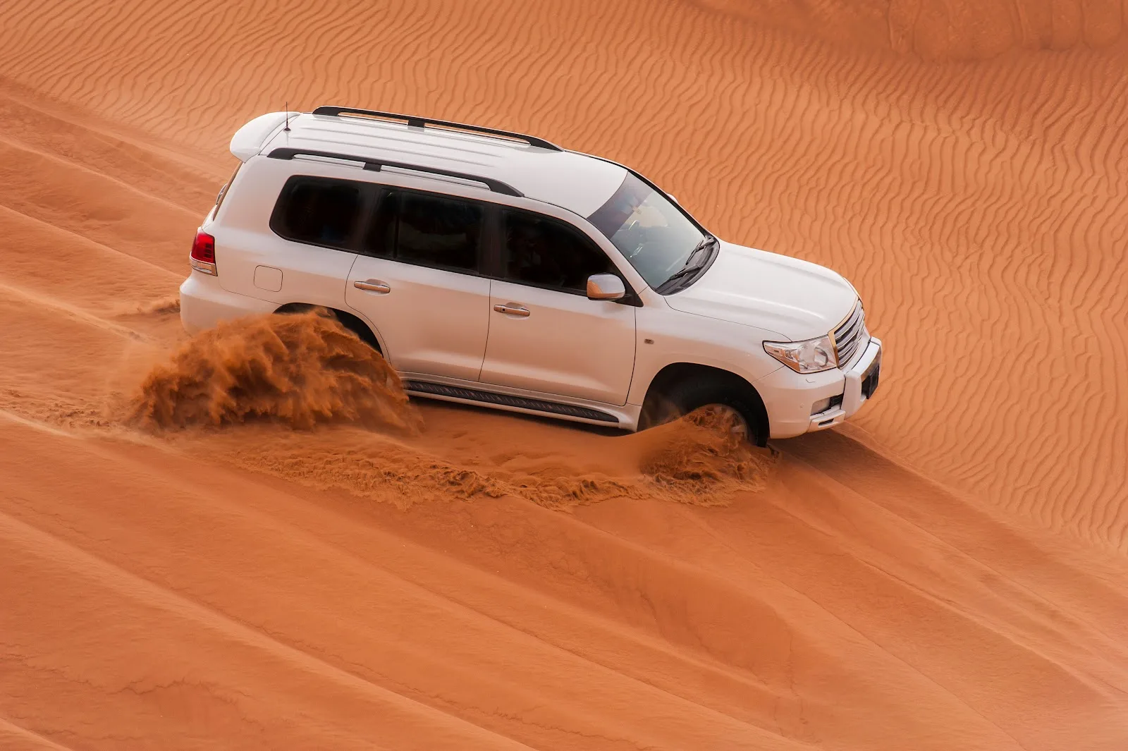 White Land Cruiser in the Desert