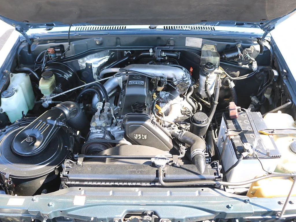 Under the hood of a 1994 Toyota Land Cruiser 70 at FLEX in Japan