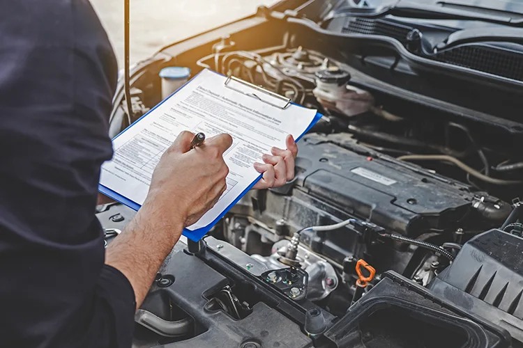 A Toyota Mechanic Inspecting a Used Sequoia