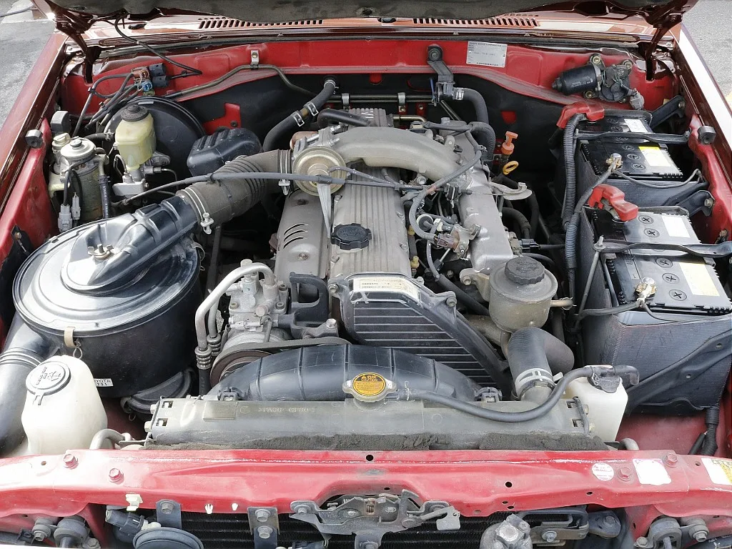 Diesel engine under the hood on 2001 Toyota Land Cruiser 70 at FLEX in Japan