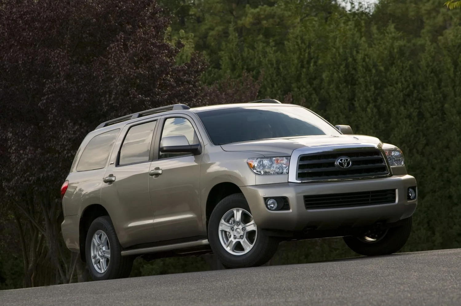 Toyota Sequoia parked on a rocky mountain