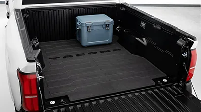 OEM bed mat installed in Tacoma truck bed